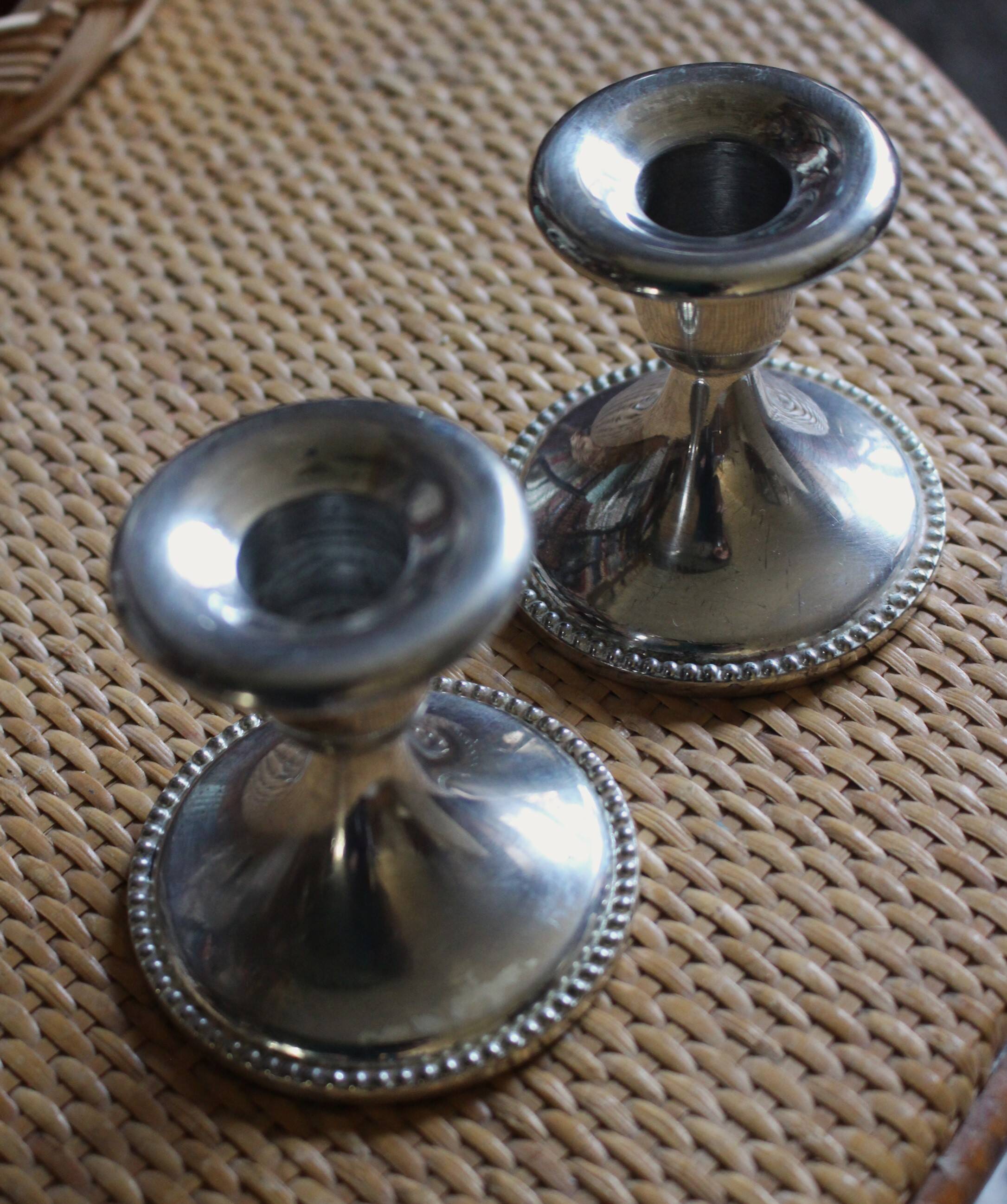 Pair of chrome metal candlesticks