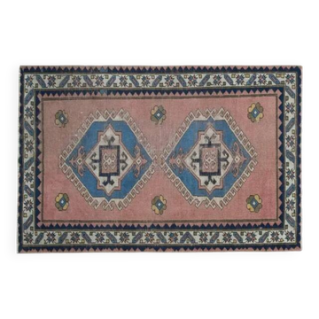 Tapis vintage turc fait main en laine et coton rose des années 1970 114x172