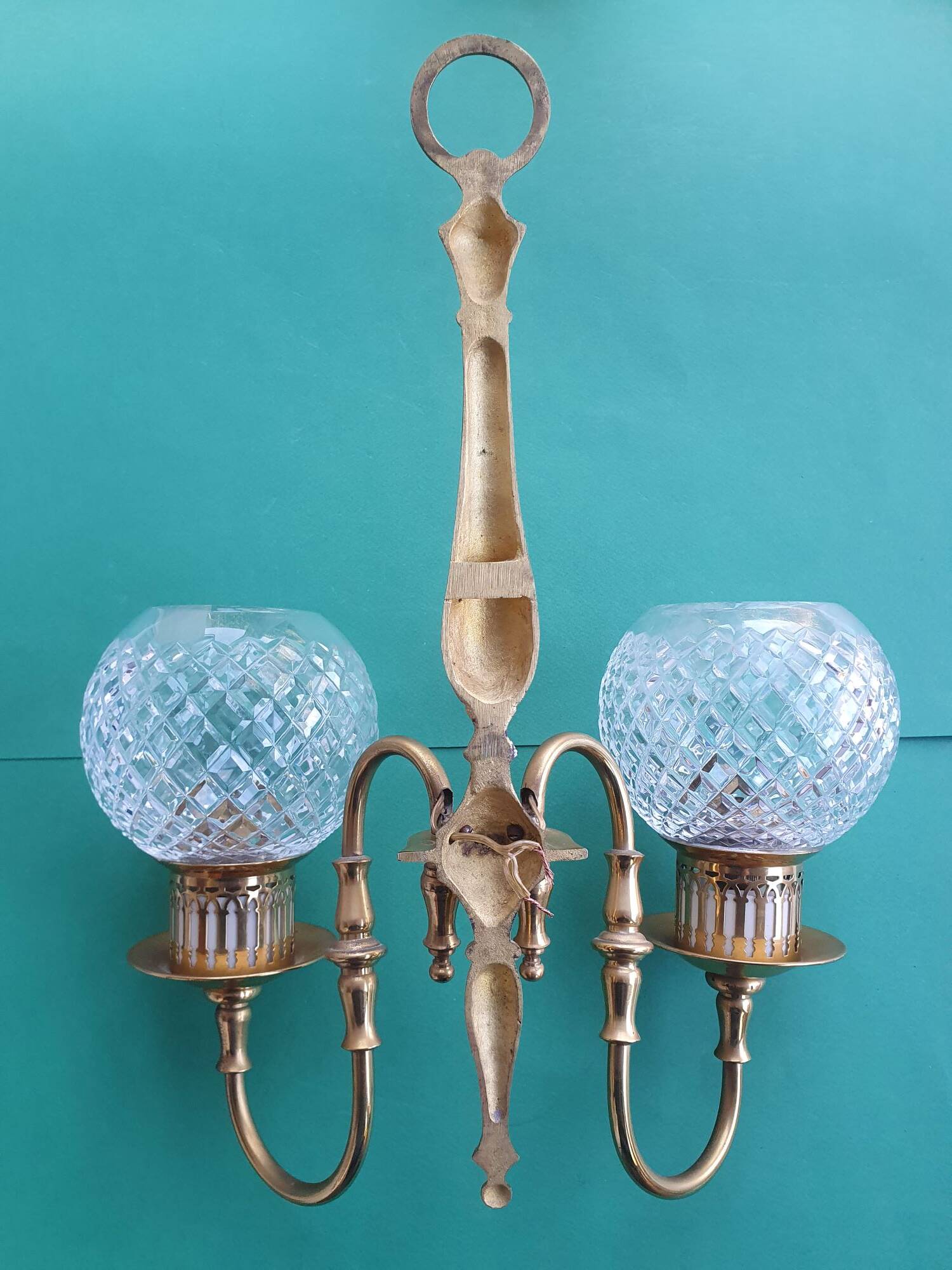 Two-light wall light gold with antique crystal globes