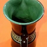 Glazed terracotta pitcher decorated with beaded friezes
