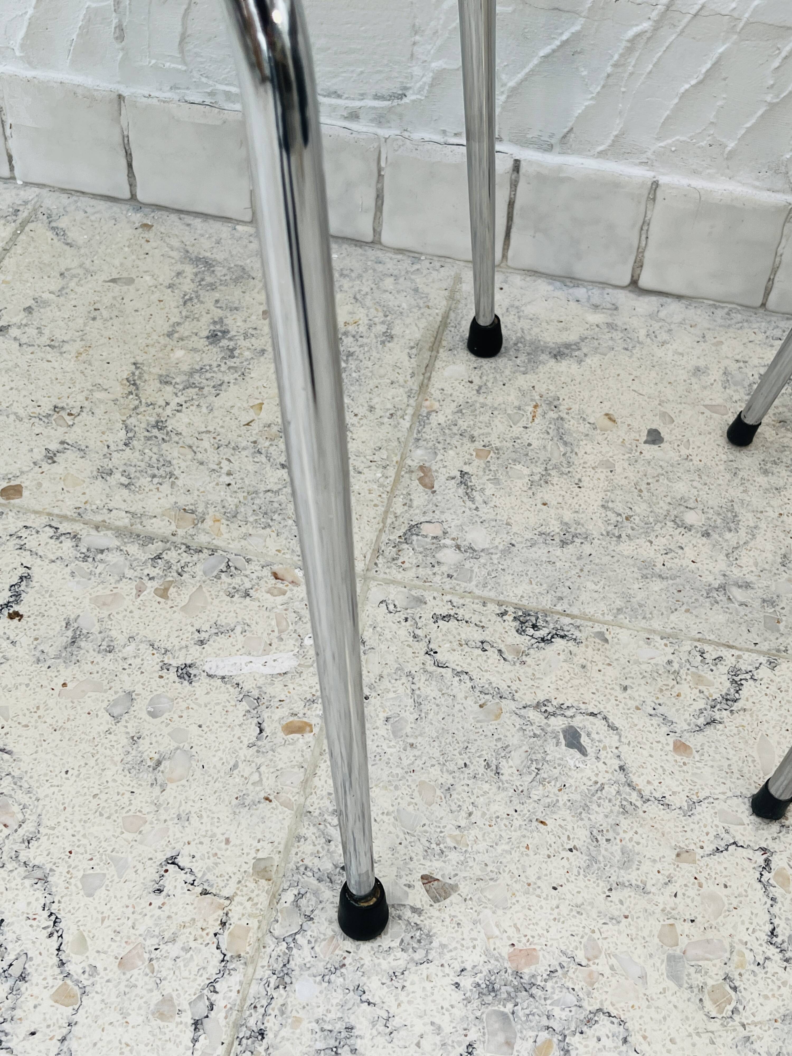 Pair of vintage yellow chrome Formica kitchen chairs.