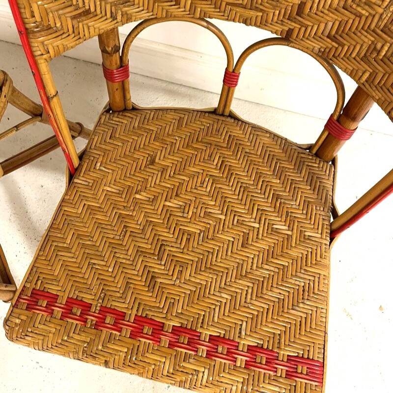 Set of 4 antique chairs in woven red and natural rattan.