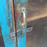 Old blue wooden showcase