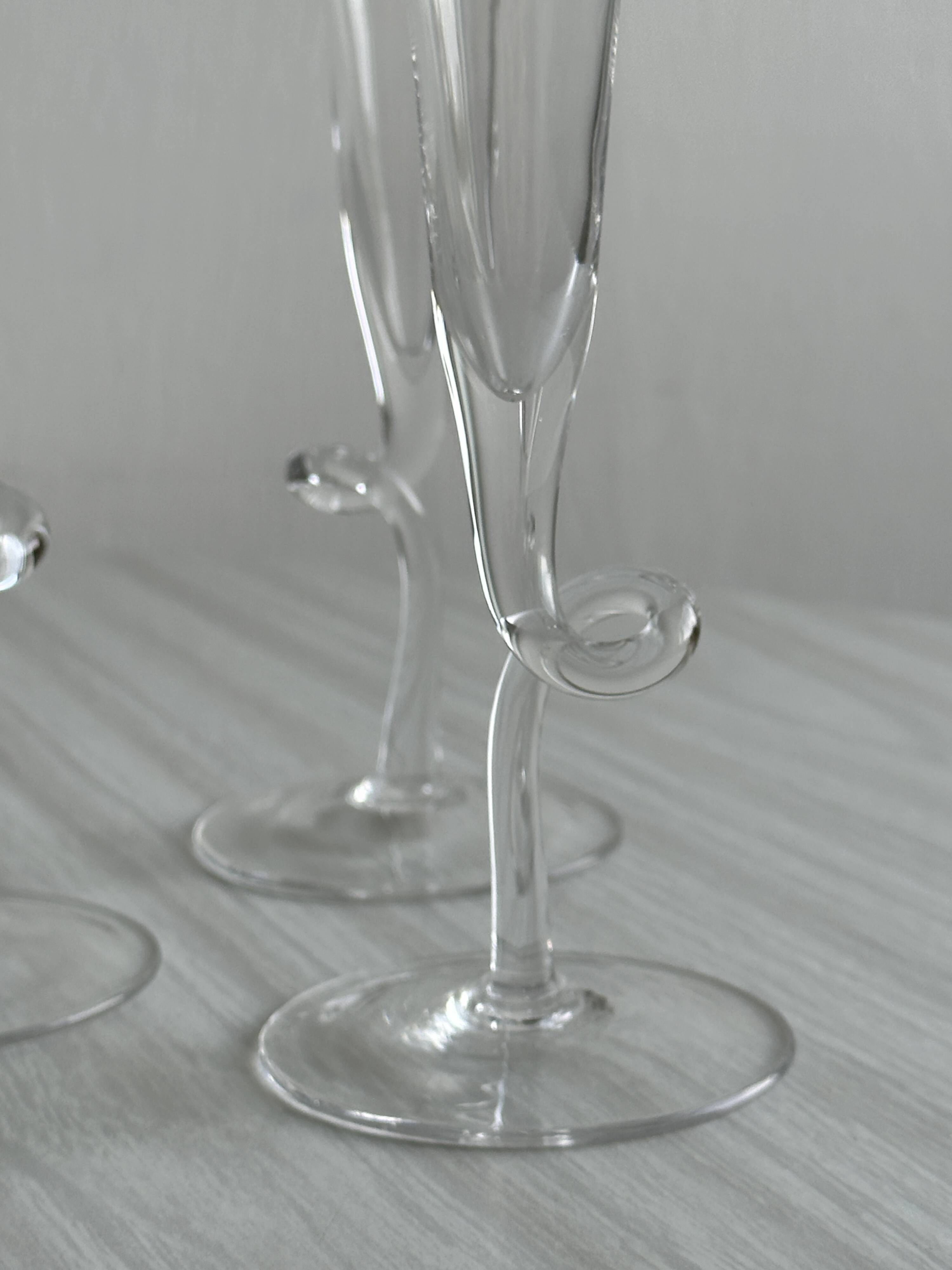4 blown glass champagne flutes with twisted stem