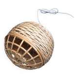Pendant light with spherical lampshade in woven bamboo