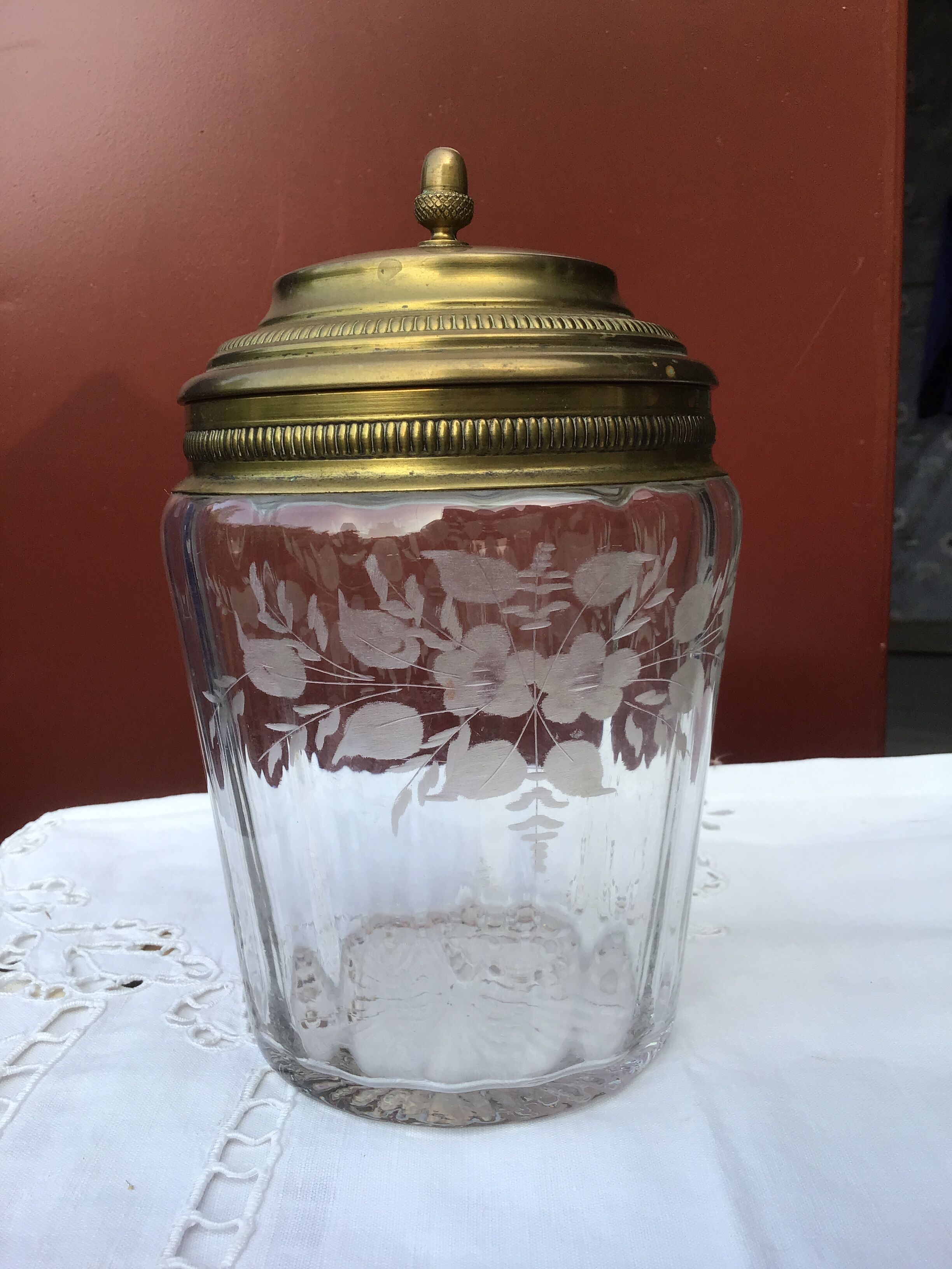 Glass cookie jar engraved metal frame brass