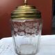 Glass cookie jar engraved metal frame brass