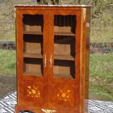 Glass library with rosewood marquetry in the Louis XV style.
