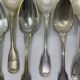 Set of 9 silver-plated soup spoons with a bi-lobed filet pattern.