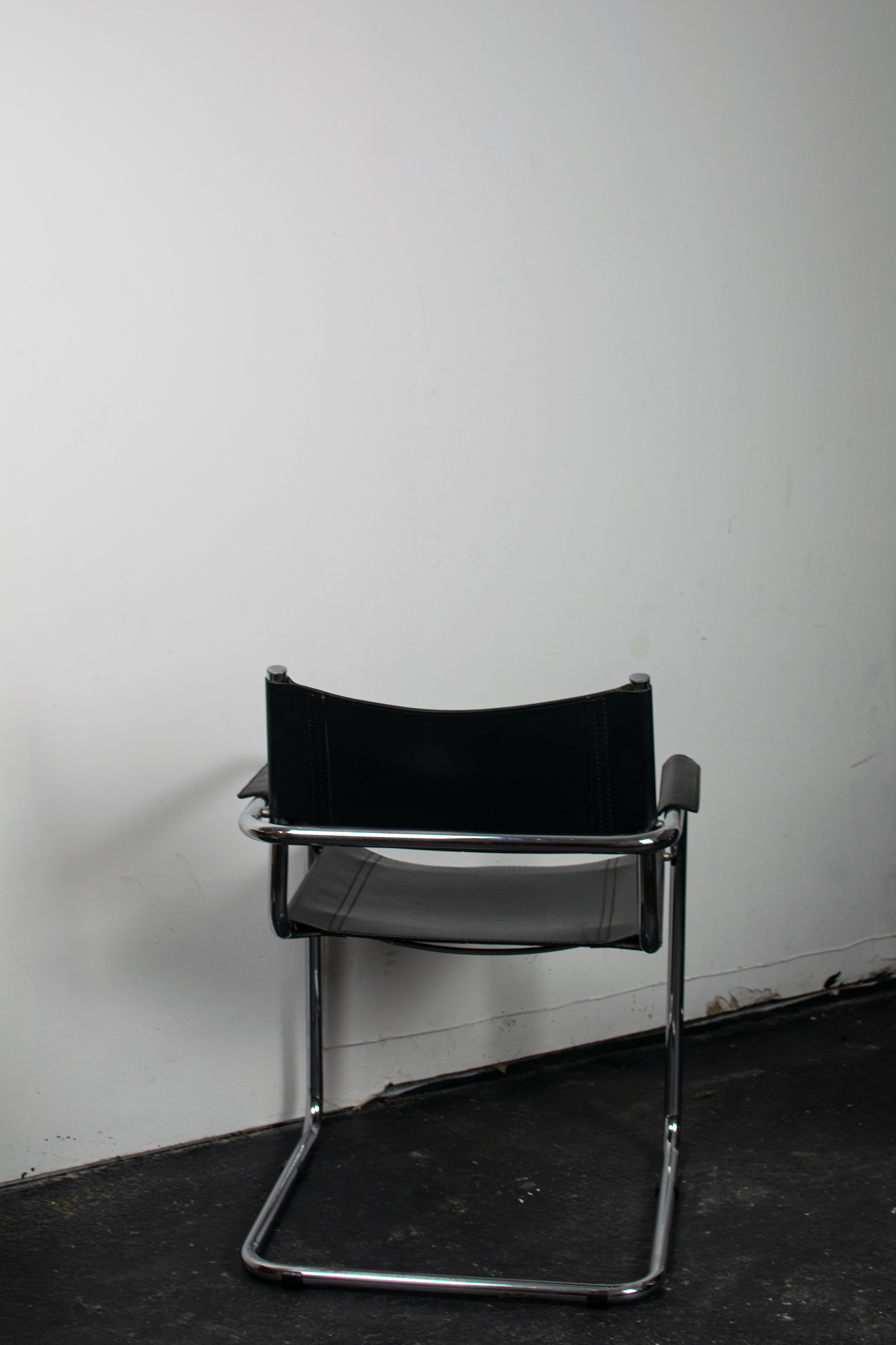 Black leather cantilever armchair 70s-80s