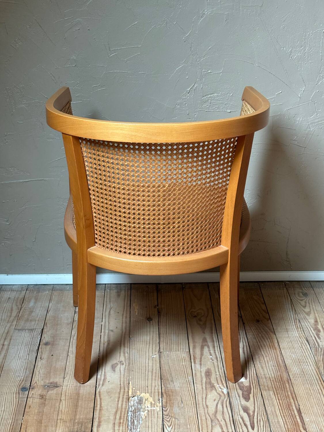 Wooden and cane cabriolet armchair