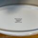 Set of two snake-patterned porcelain dishes.