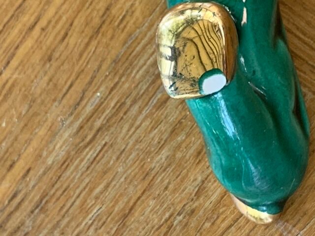 8 knife-wielding gazelles dabbling in green enamelled ceramic and vintage gold 1950