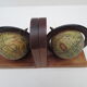 Old pair of greenhouse books in solid wood and world map