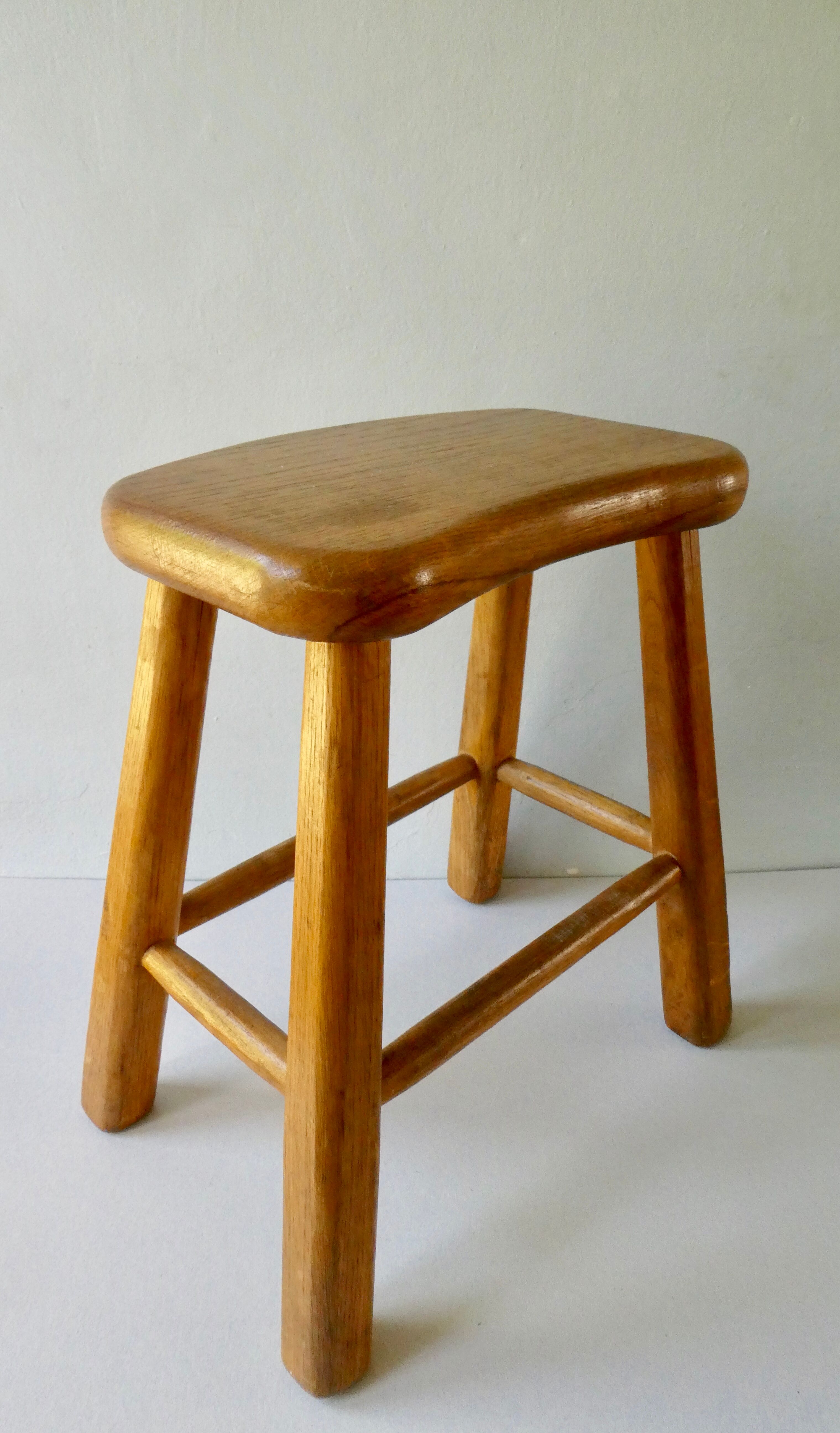 Light wood stool, free-form seat