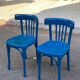 2 blue bistro chairs in curved solid wood