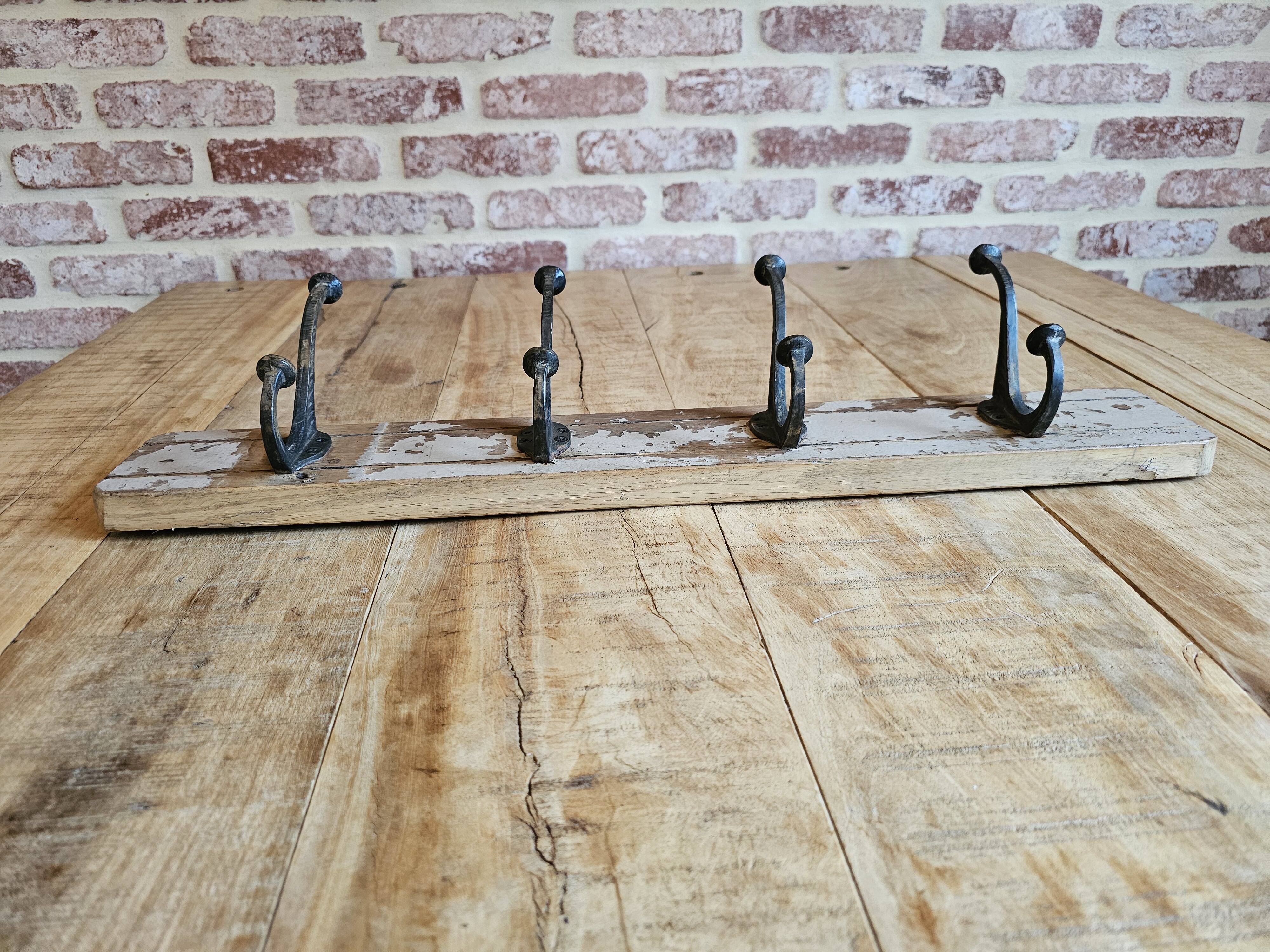 Solid teak coat hook with 4 double cast iron hooks