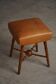 Turned wooden stool with leather seat, mid-20th century, Danish modern.