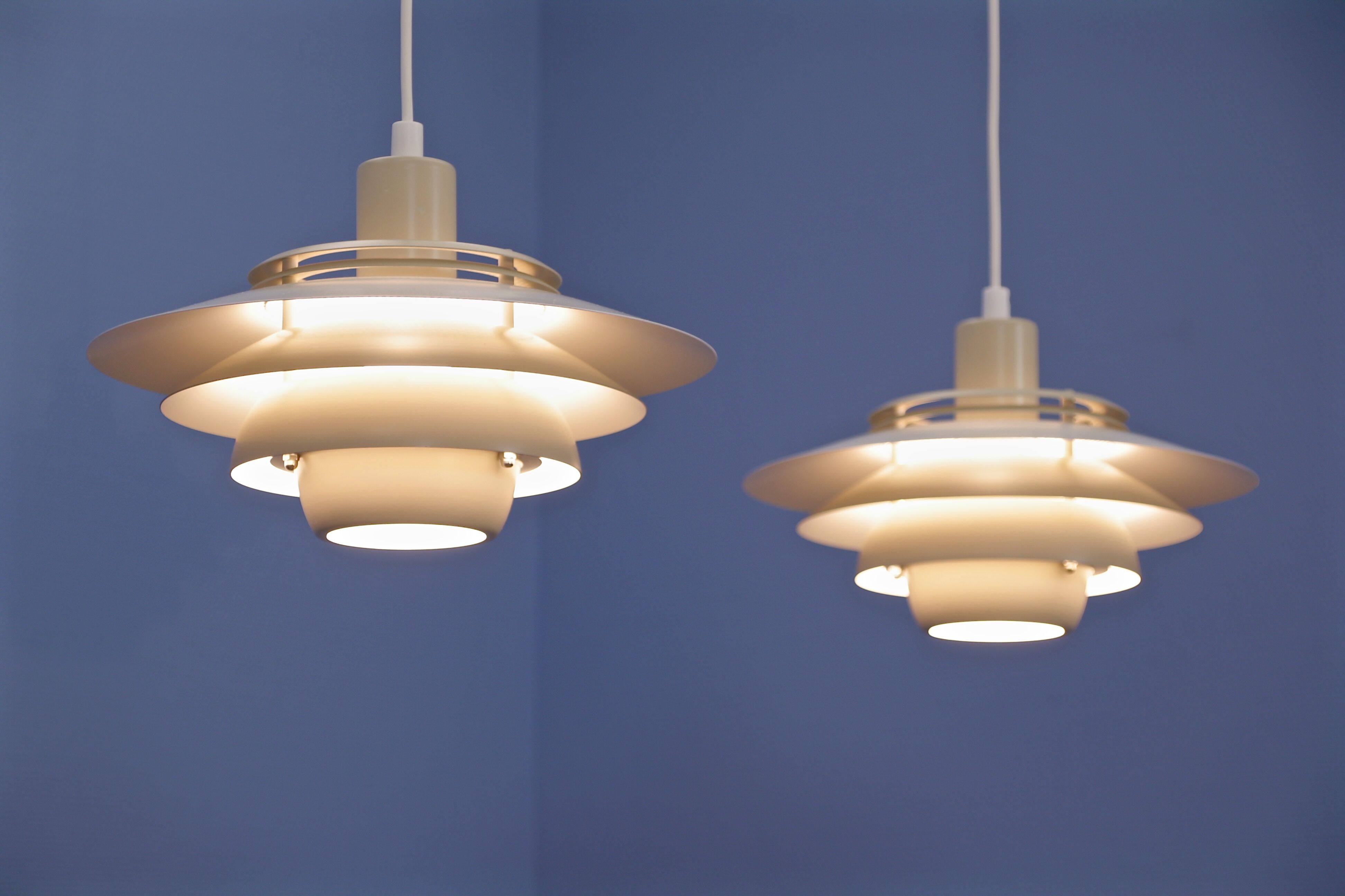 Set of 2 Danish multi coloured pendants in white and beige by Jeka, 1970s