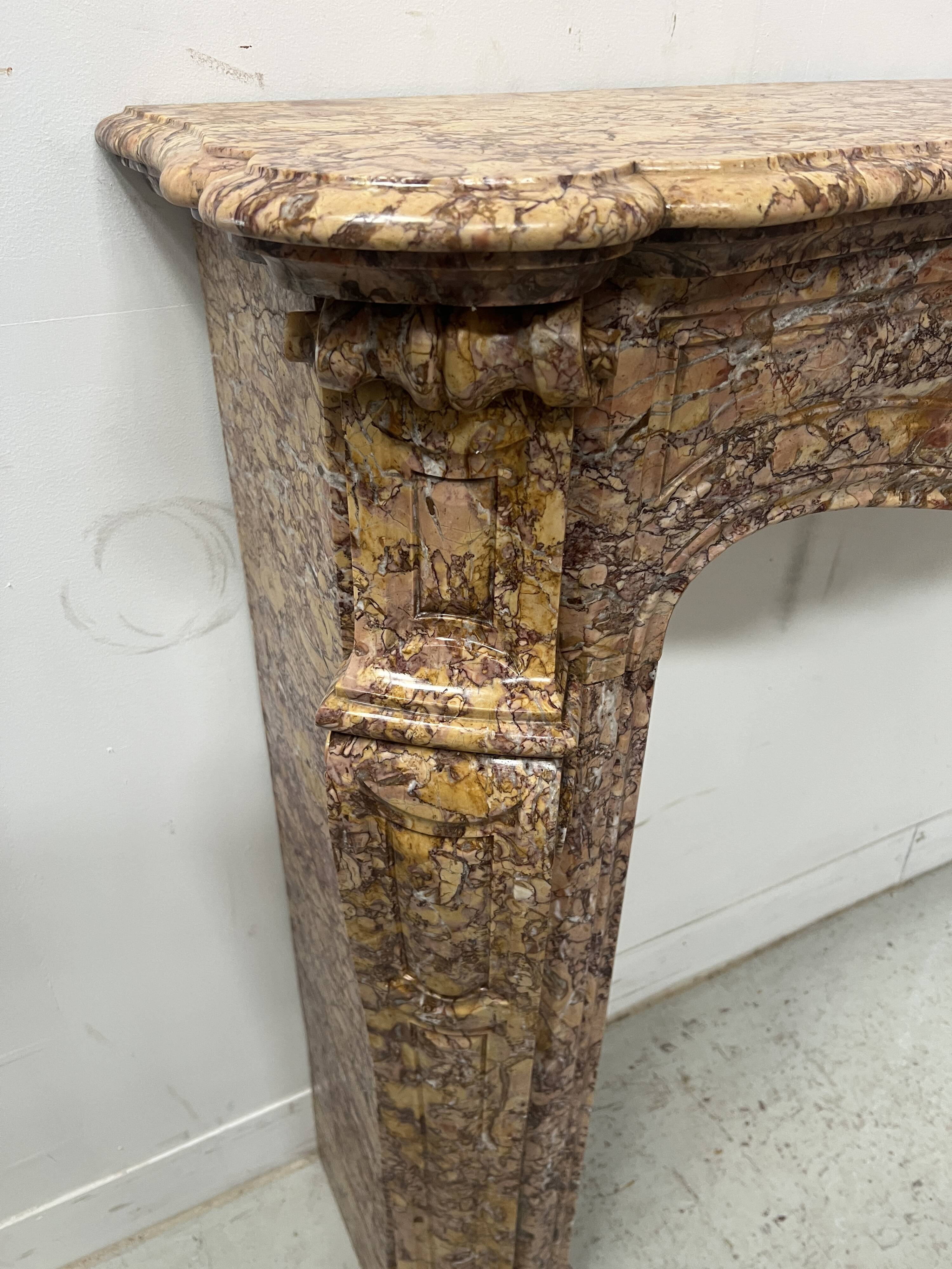 Louis XV style fireplace, Pompadour model, speckled breccia marble, 19th century