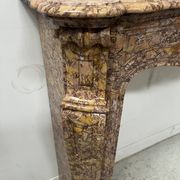 Louis XV style fireplace, Pompadour model, speckled breccia marble, 19th century