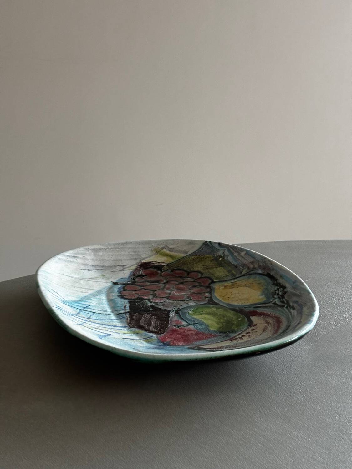 Ceramic bowl with abstract fruit patterns