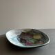 Ceramic bowl with abstract fruit patterns