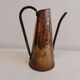 Watering can from the 1950s, made of hammered copper and brass