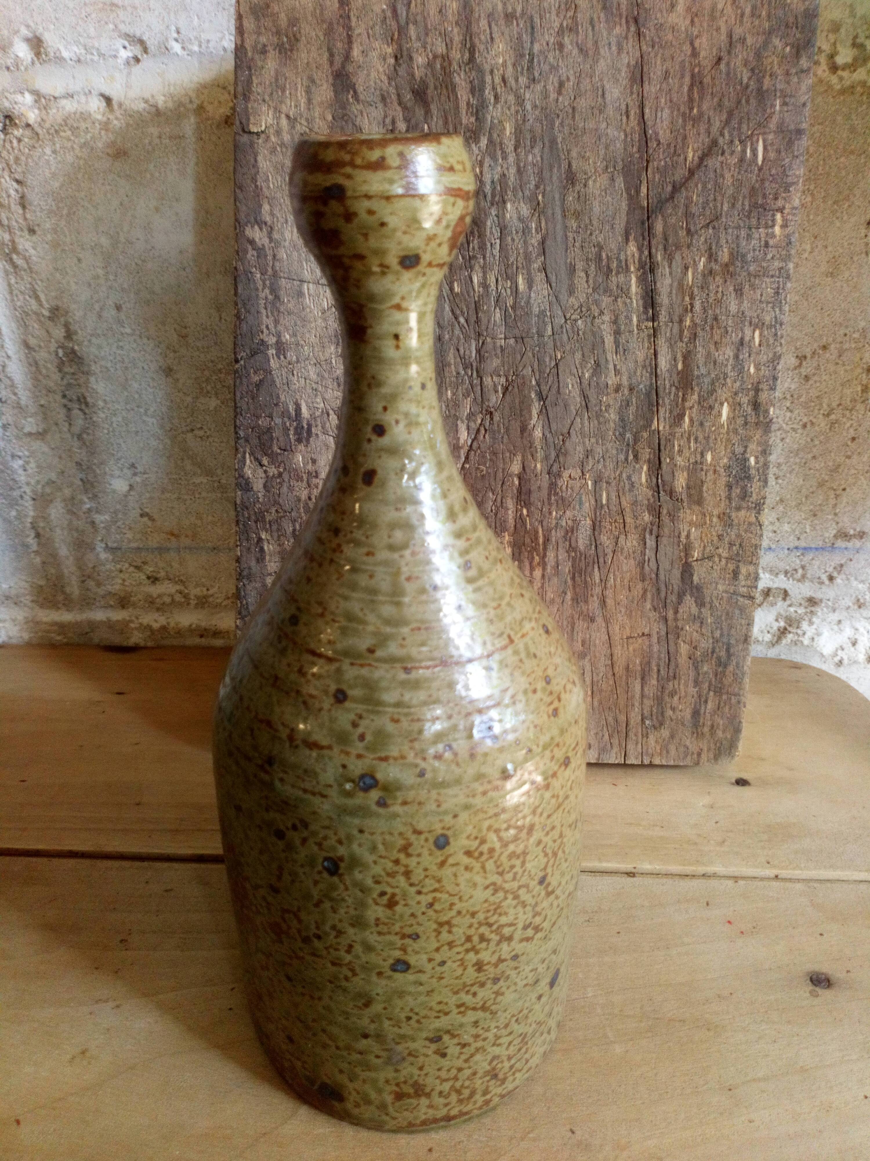Bottled sandstone vase with a narrow neck