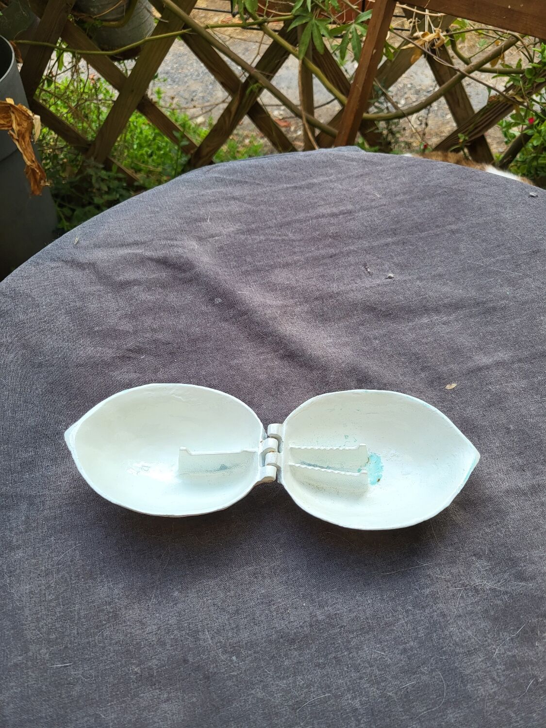 Vintage cast iron nut crate