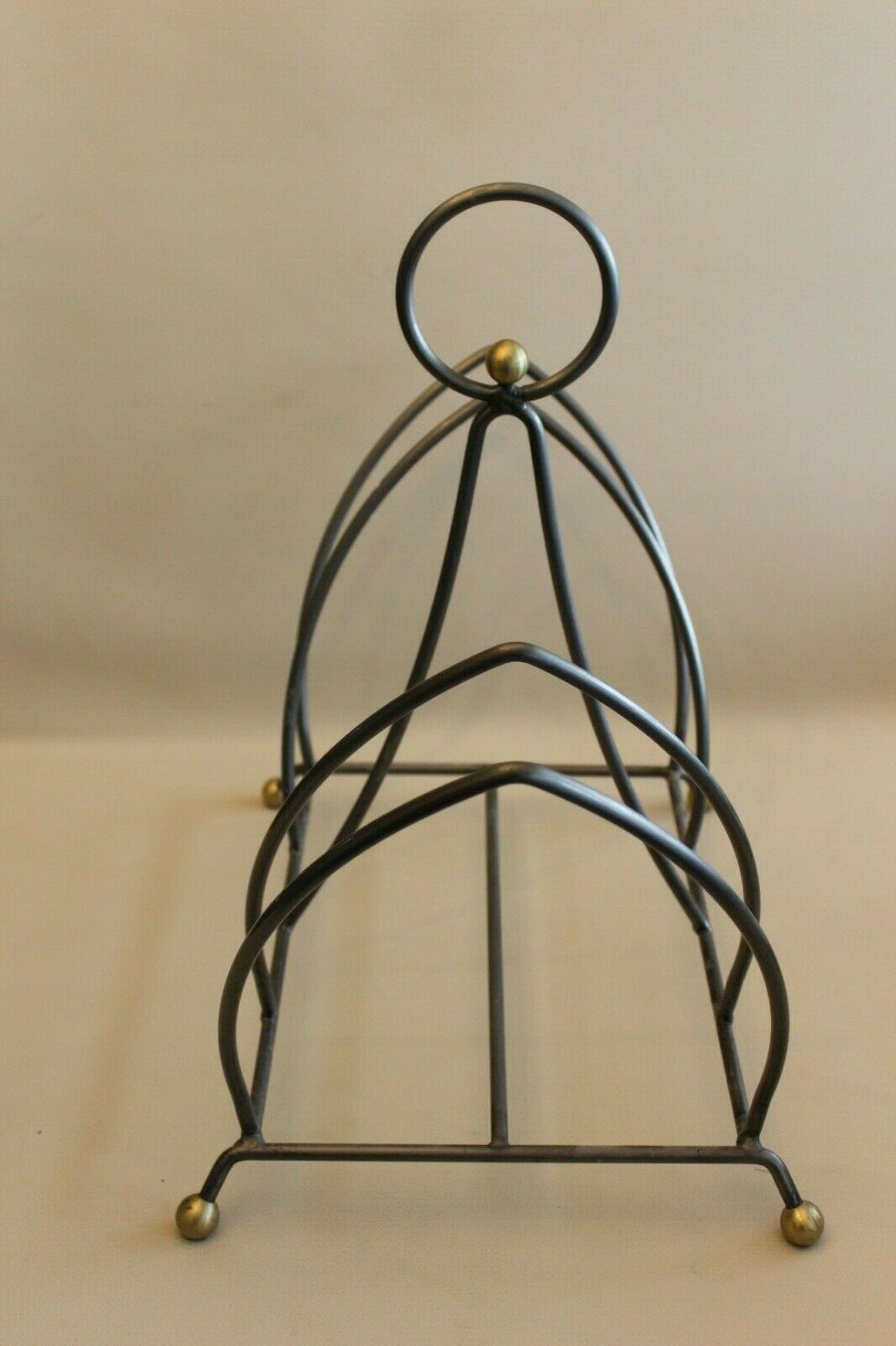 Porte-revue design en métal art déco