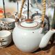 Asian set of a teapot and its cups
