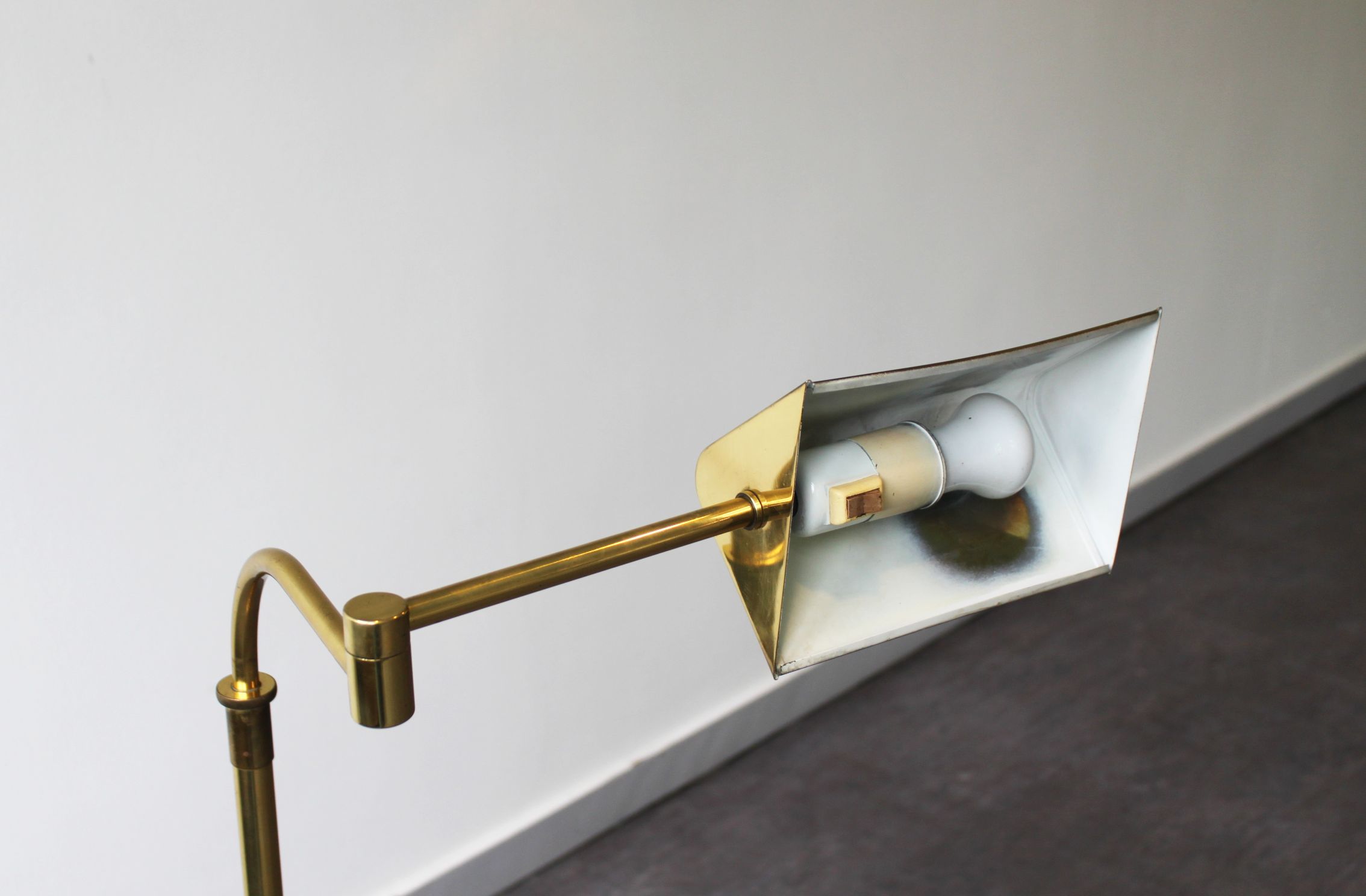 Gilded brass articulated reading light, France, 70's.