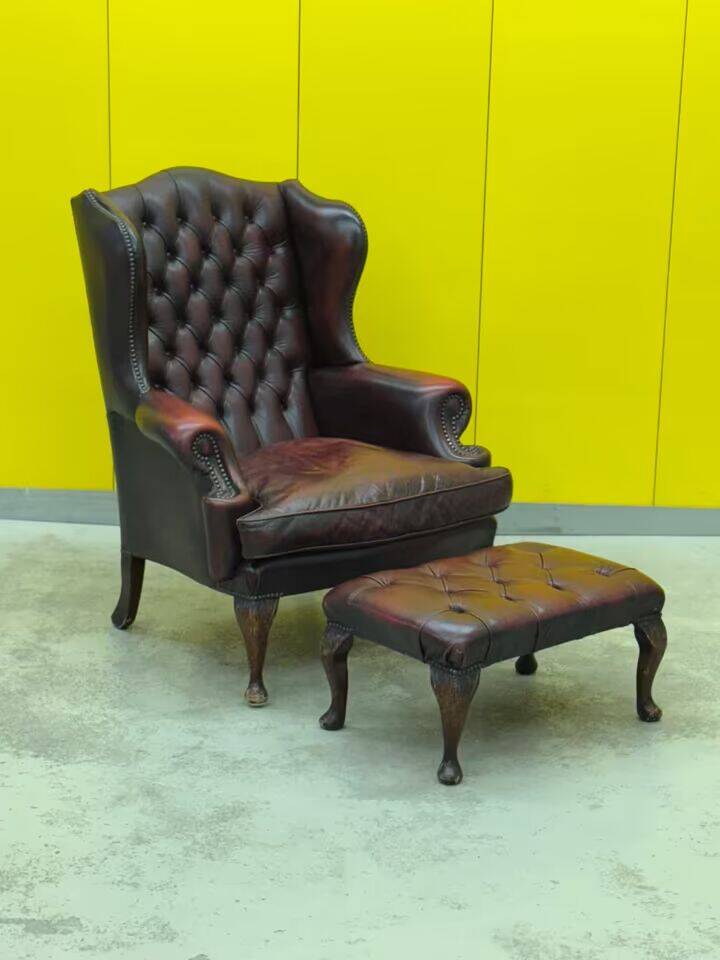 Burgundy leather chesterfield wing chair with Ottoman
