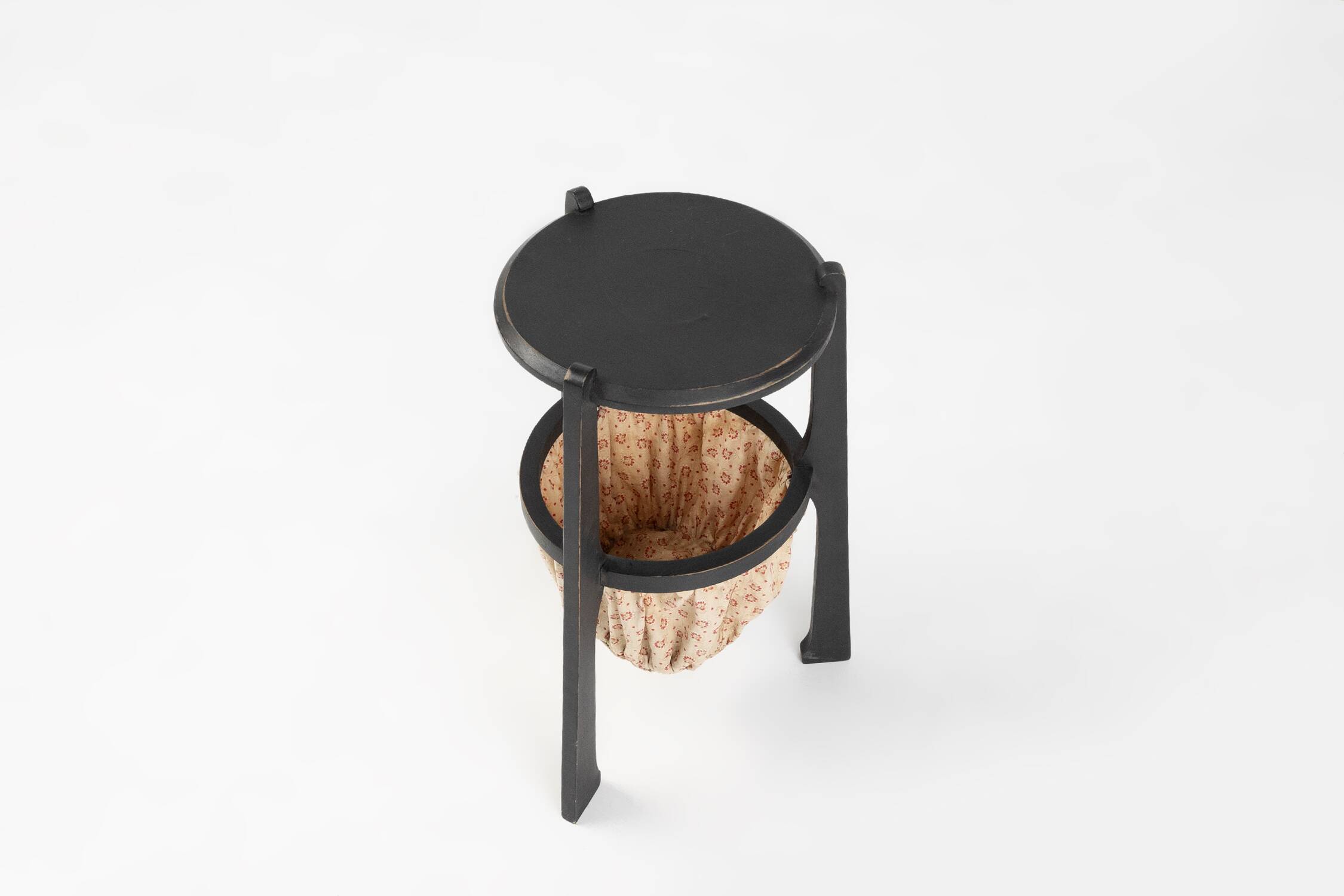 Art Nouveau side table in blackened wood with storage basket, Belgium ca. 1910