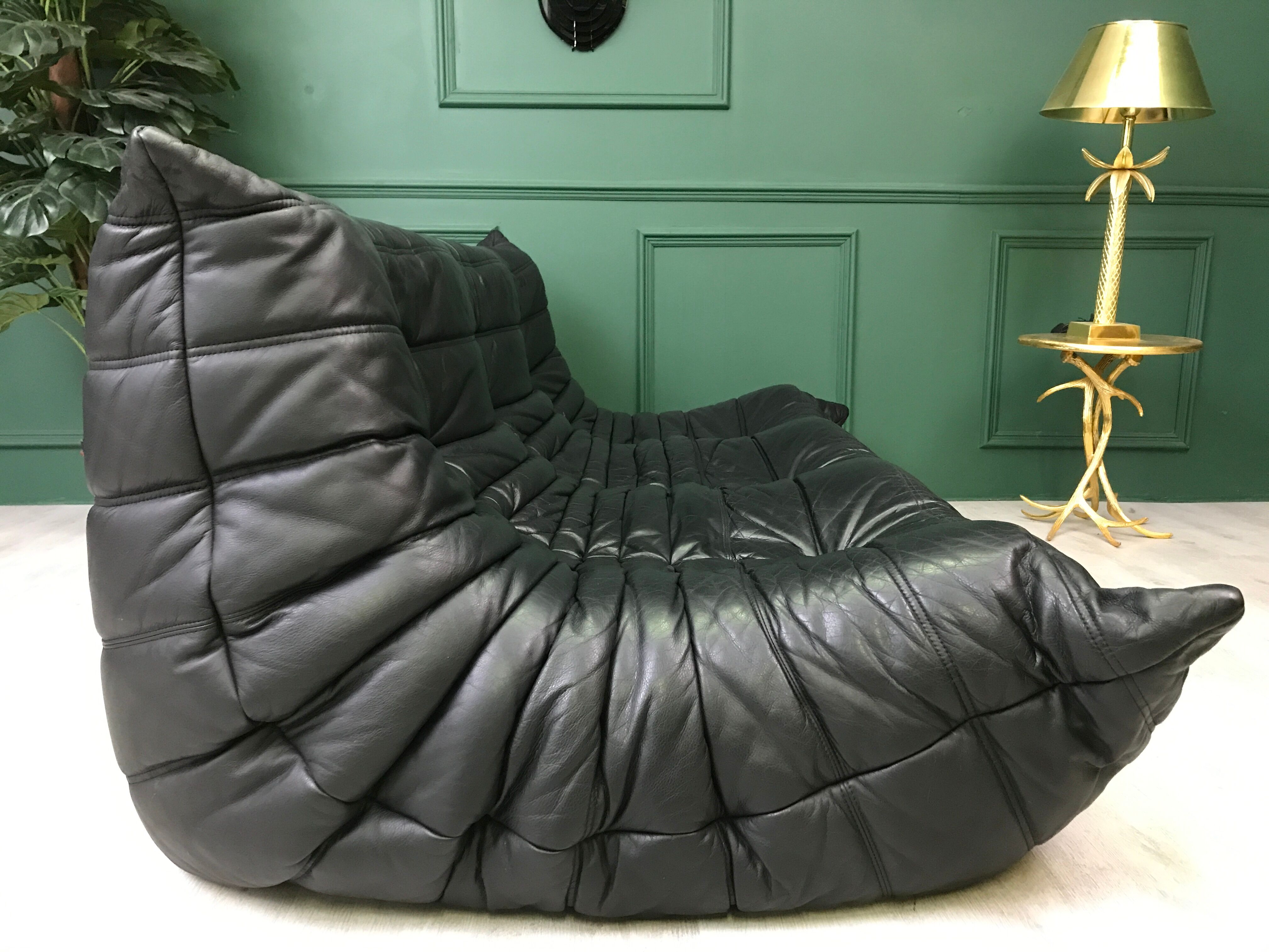 Black leather three seater sofa Togo by Ligne Roset