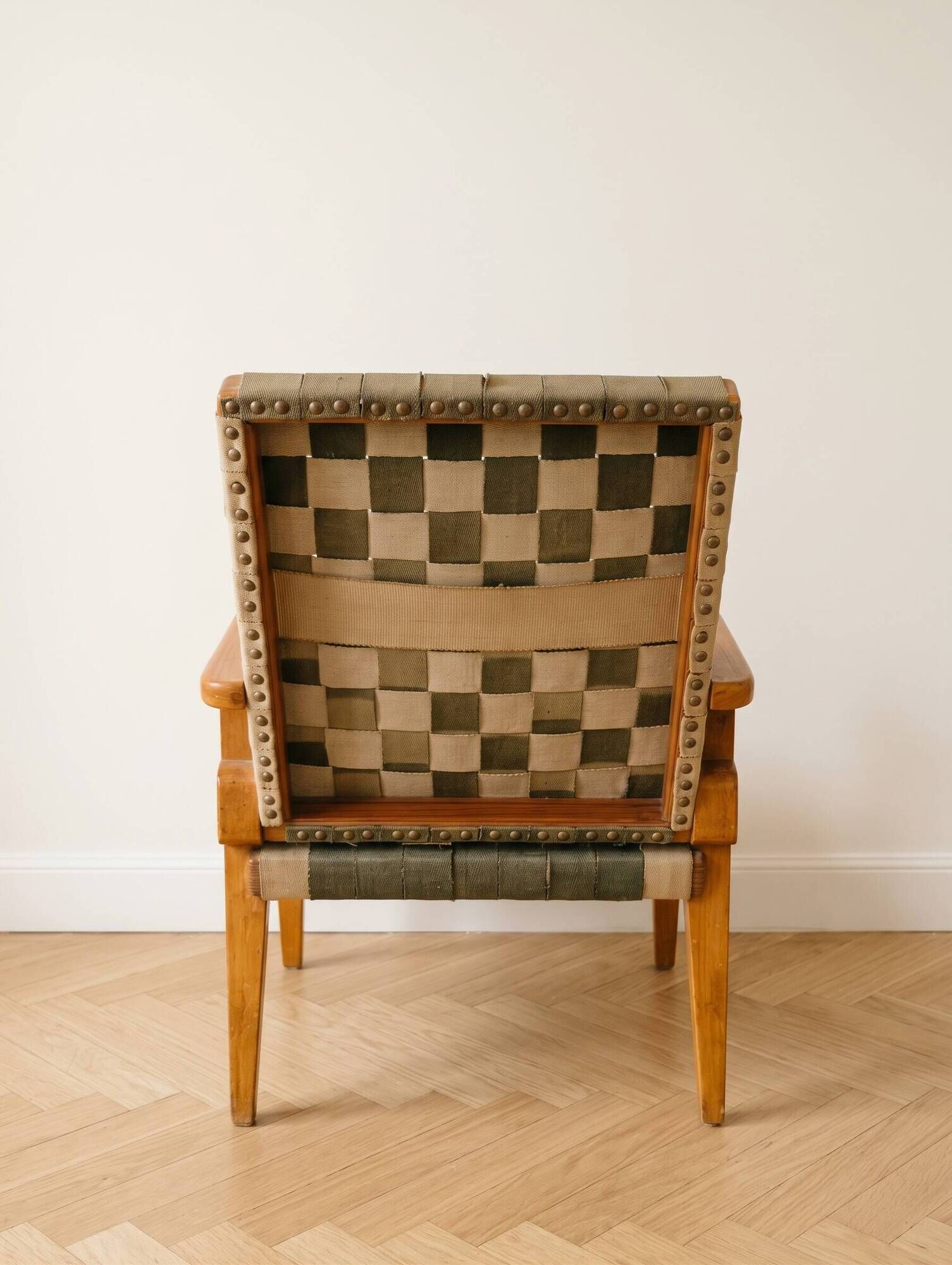 Vintage Scandinavian armchair in wood and woven strap.
