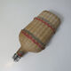 Ancient pilgrim's gourd in rattan lourdes