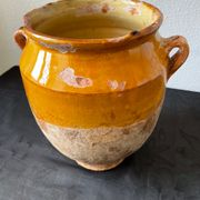Old grease pot in glazed yellow terracotta, France nineteenth century