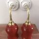 Pair of ceramic and glass wall sconces