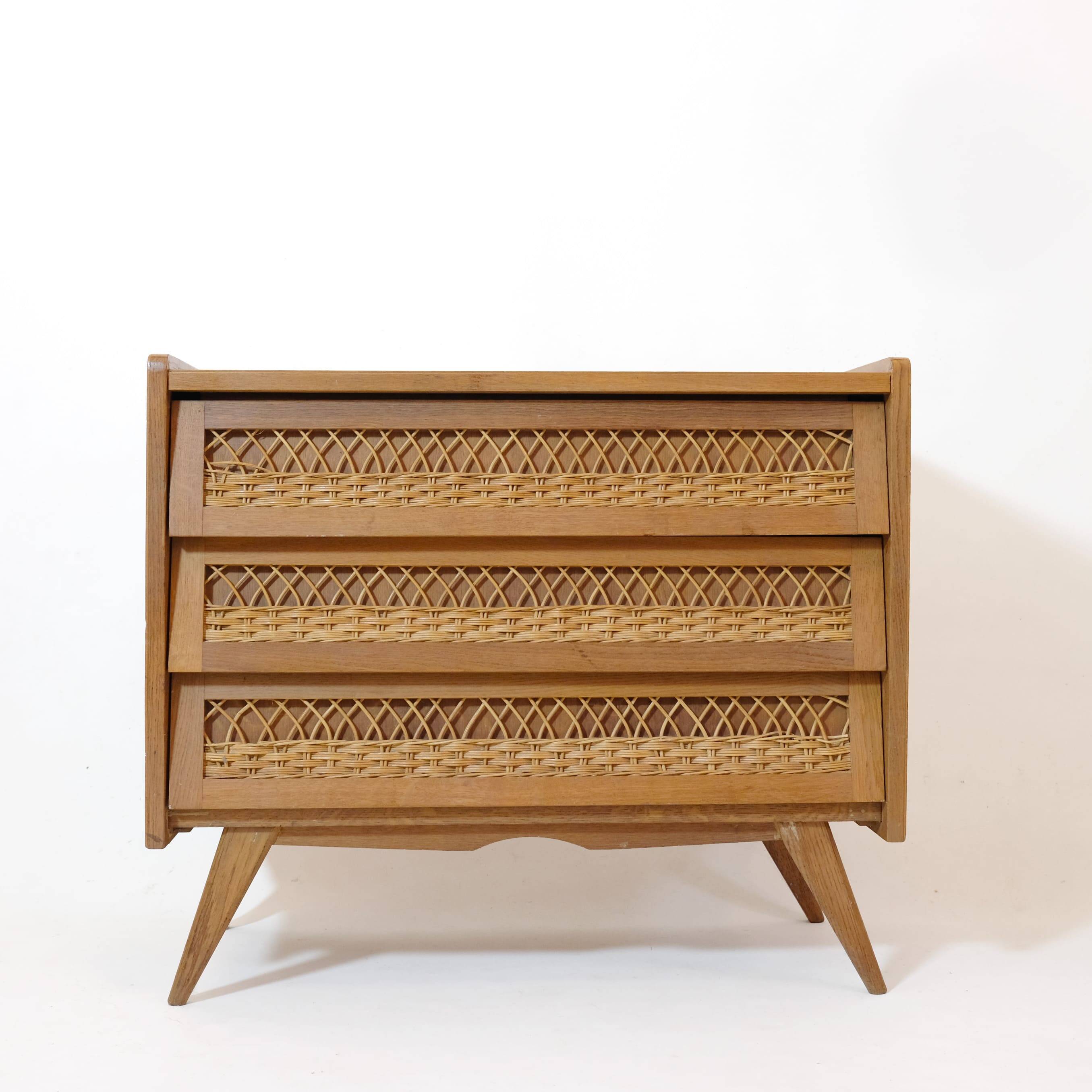 Wooden and rattan chest of drawers from the 60s.