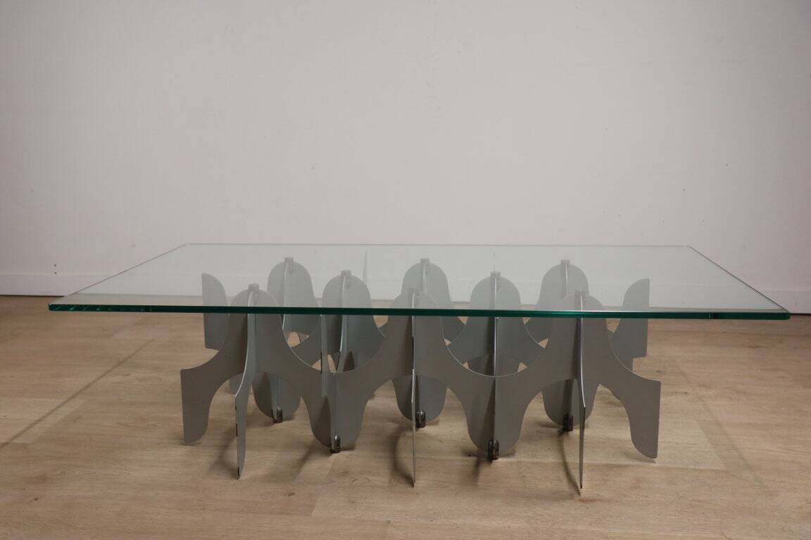 Minimalist sculptural coffee table in metal and glass