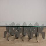 Minimalist sculptural coffee table in metal and glass