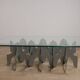 Minimalist sculptural coffee table in metal and glass