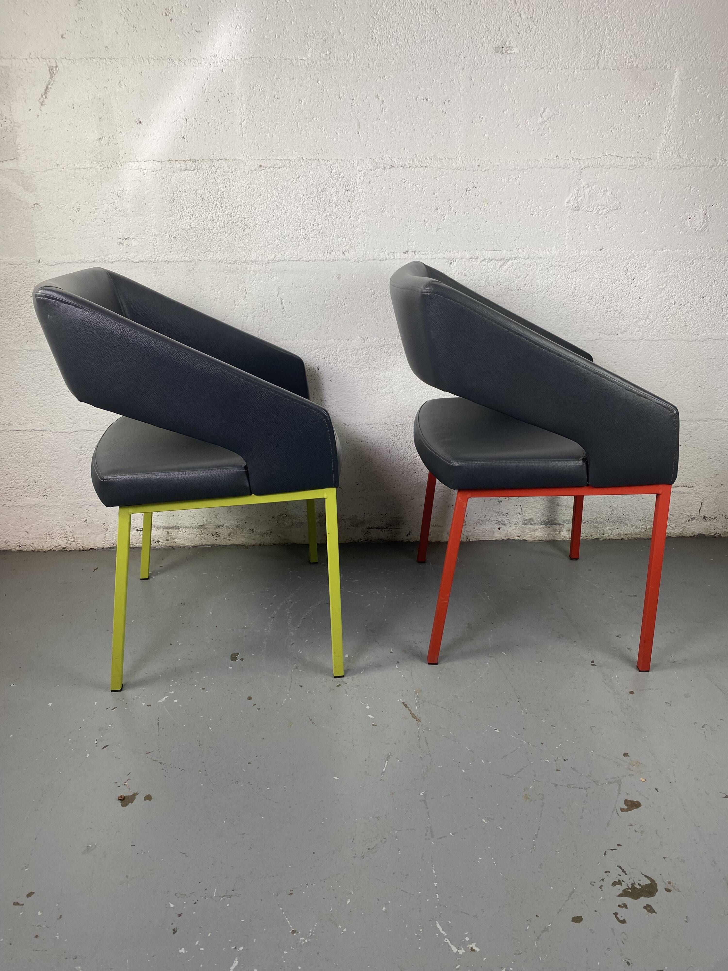 Pair of metal and leather armchairs / Green & Red