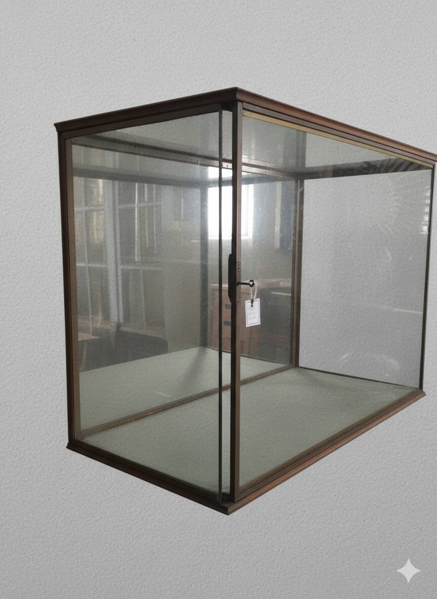 Antique display cabinet in 19th-century Gothic Revival style.
