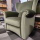 Vintage armchair in light green fabric from the 70s