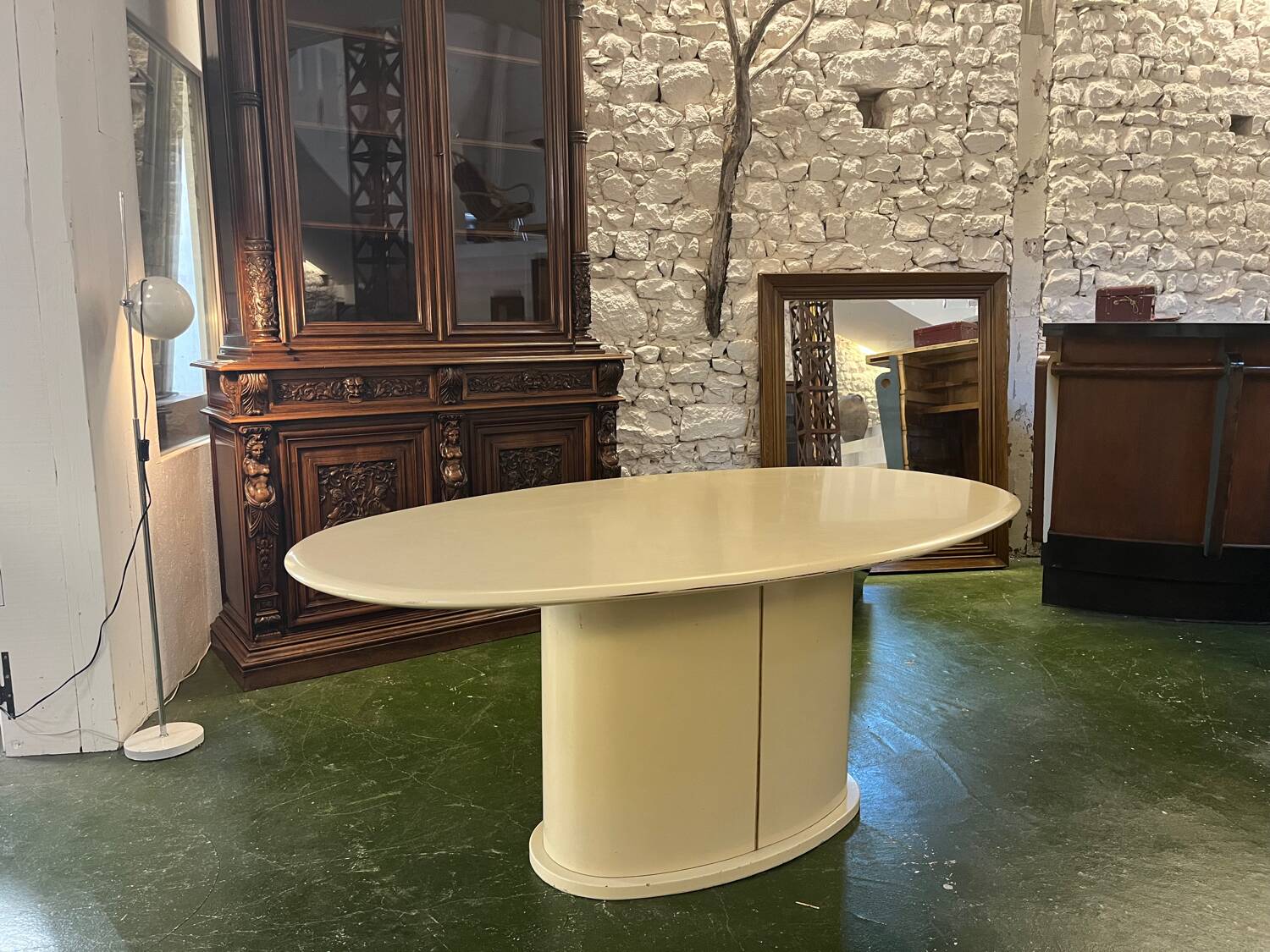 Lacquered oval dining table