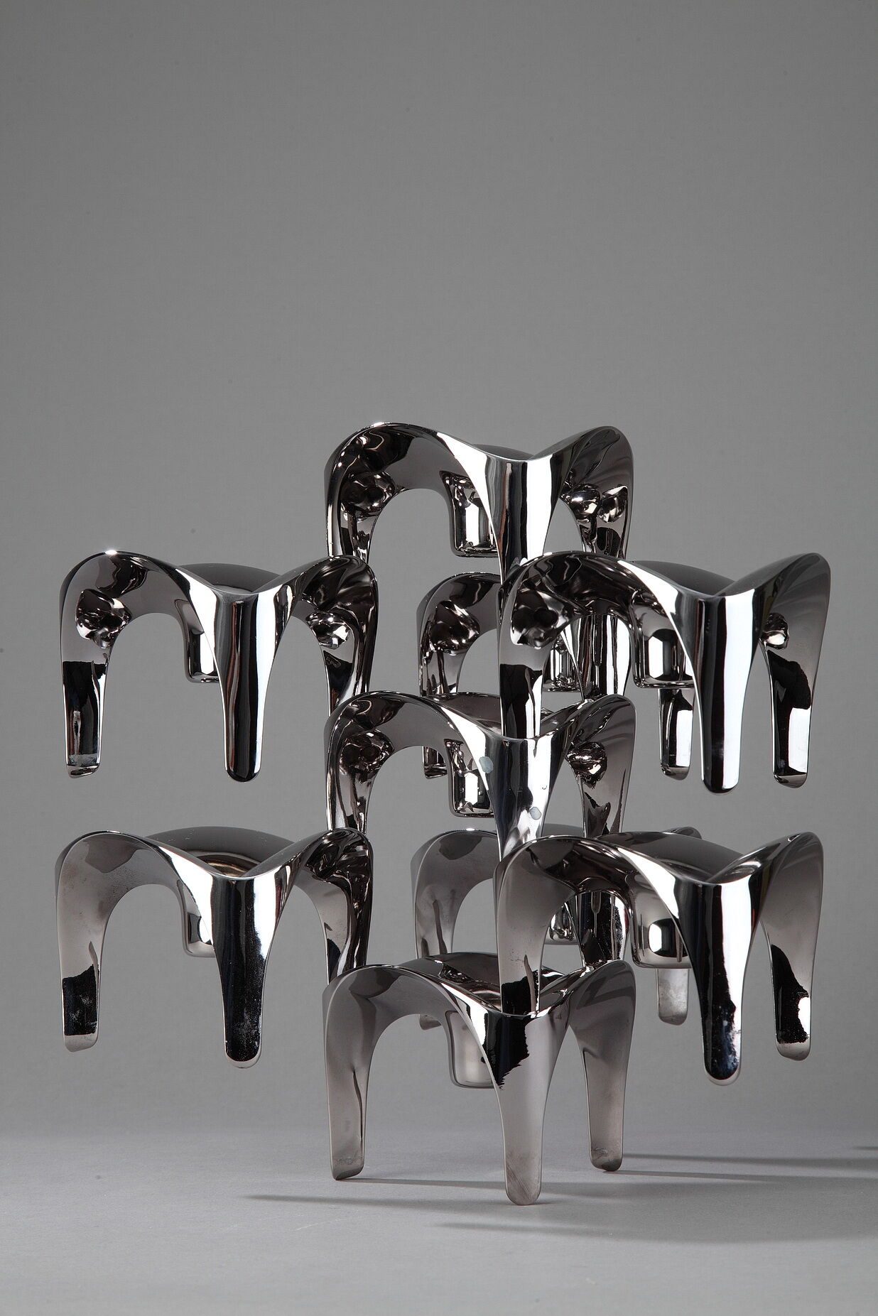 Set of 9 modular candle holders in chromed metal, nagel germany