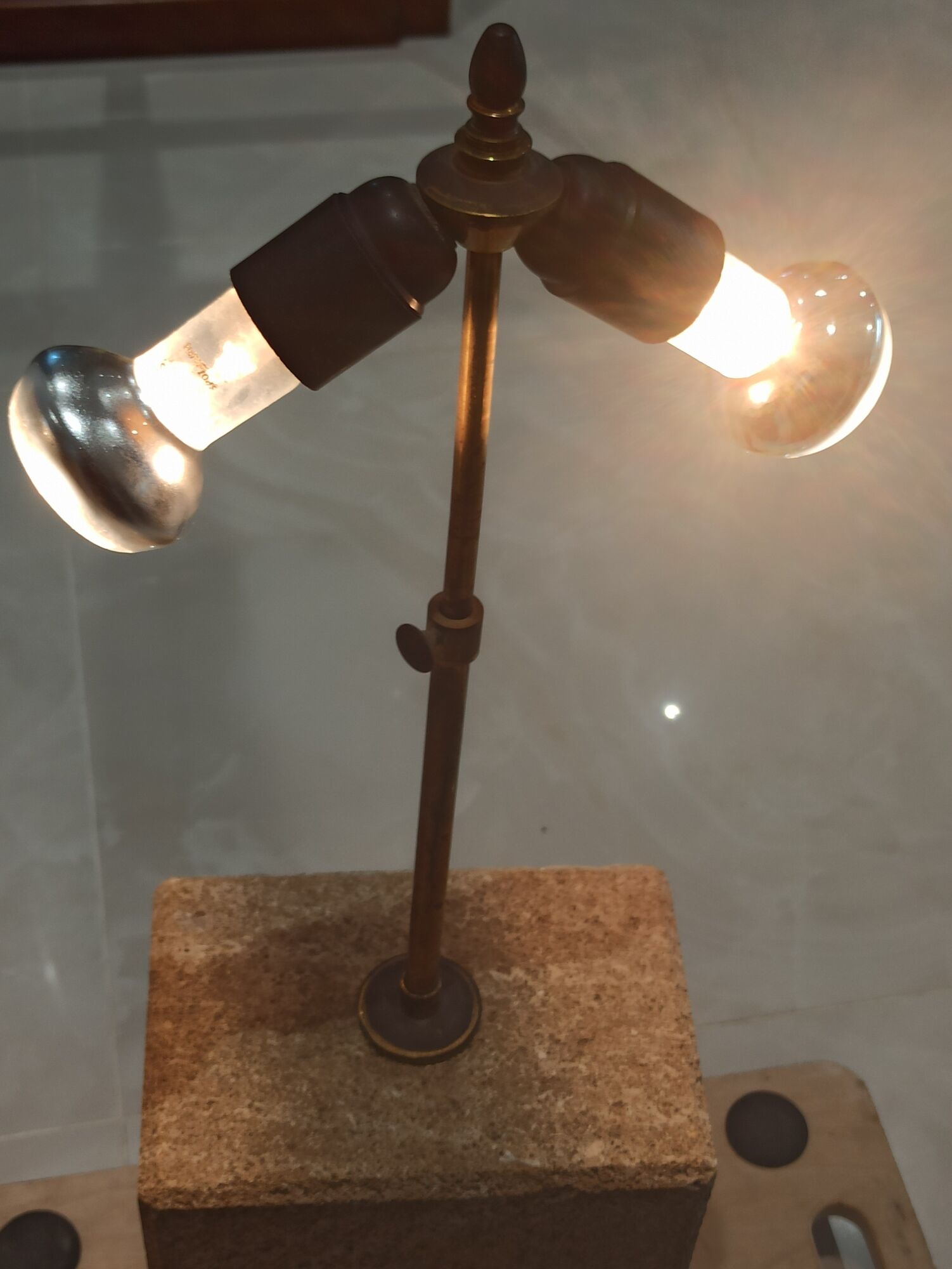 Imposing pair of lamps in Burgundy stone and brass art deco period